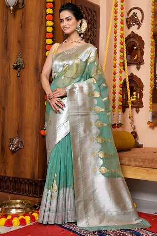 Tremendous Sea Green Organza Silk Saree With Quintessential Blouse Piece