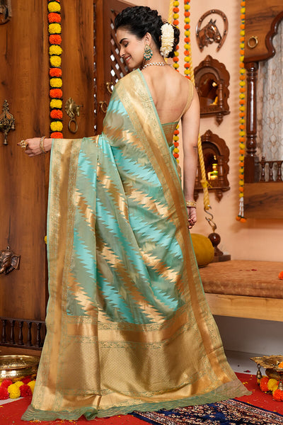 Luxuriant Firozi Organza Silk Saree With Enchanting Blouse Piece