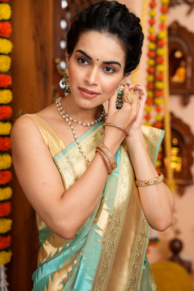 Luxuriant Firozi Organza Silk Saree With Enchanting Blouse Piece