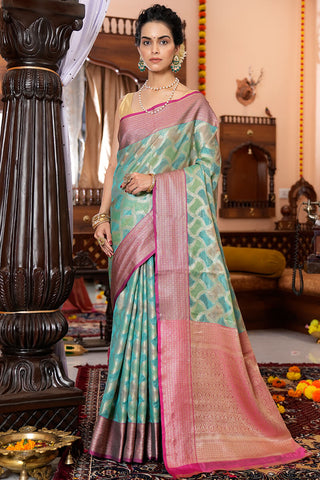 Quintessential Firozi Organza Silk Saree With Palimpsest Blouse Piece