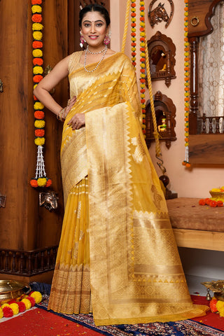 Radiant Yellow Organza Silk Saree With Mesmeric Blouse Piece