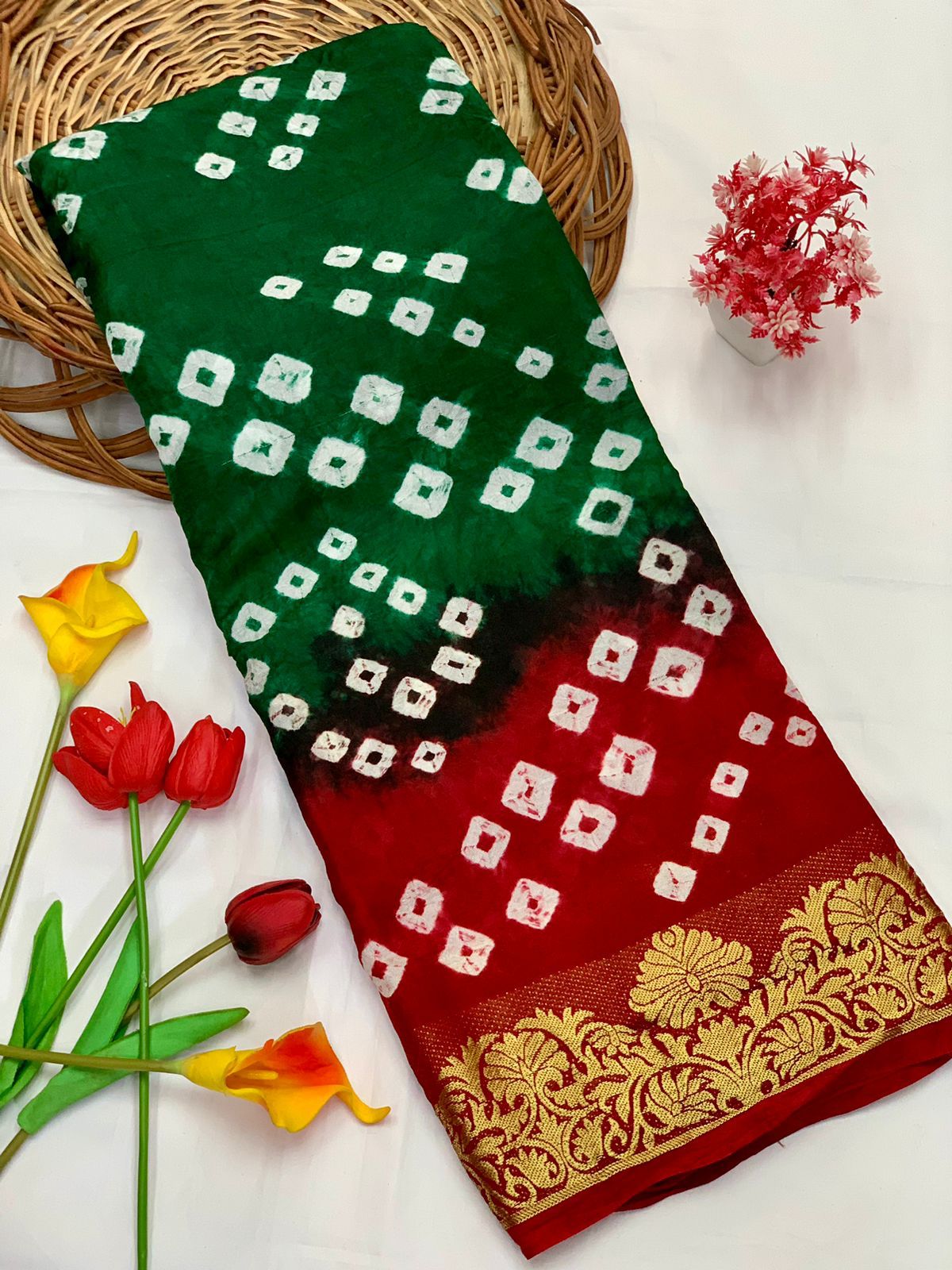 dreamy Dark Green Bandhani Silk Saree With Exquisite Blouse Piece